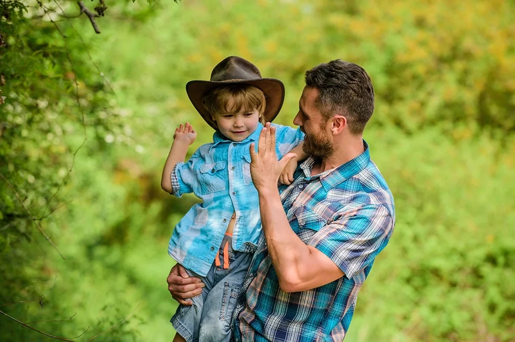 A father takes a walk with his son in Texas