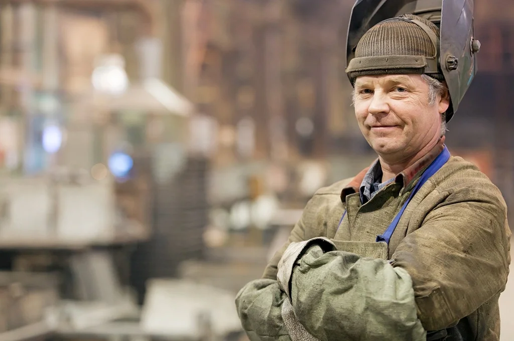 A veteran on the site at his welding job after changing careers at 50