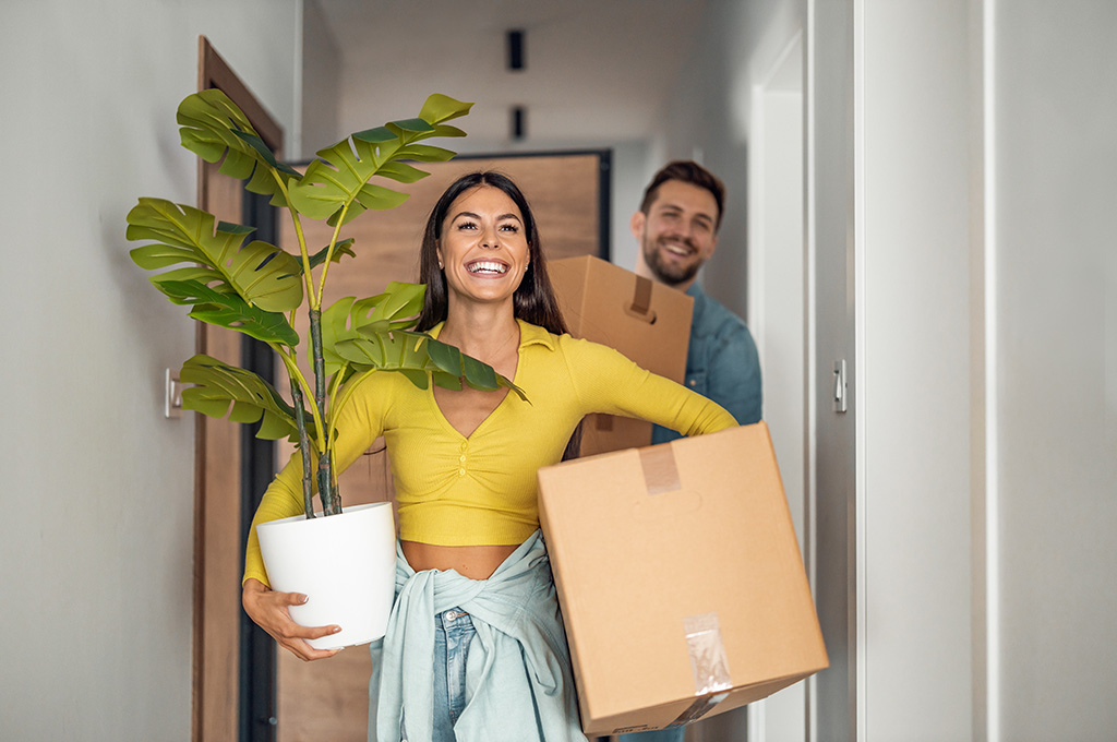 A military member and her spouse moving into their new apartment after finding out if bah covers rent