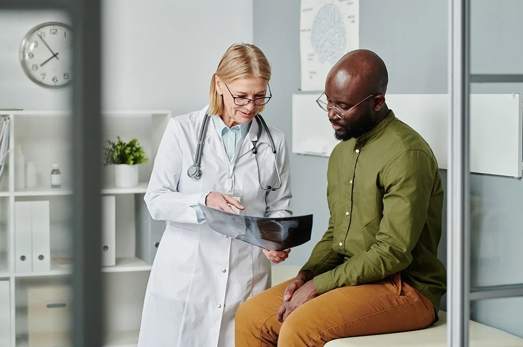 A veteran at the doctors office after using his VA medical benefits eligibility