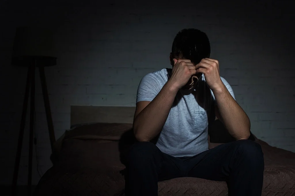 man struggling with mental health