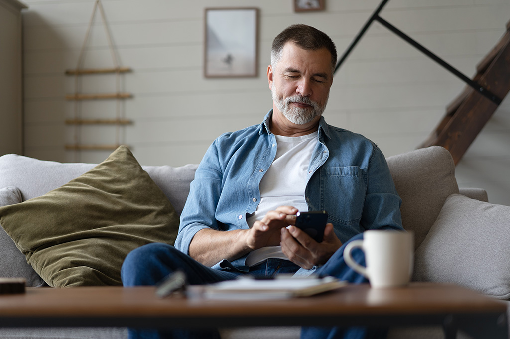 A veteran at home looking over his disability income