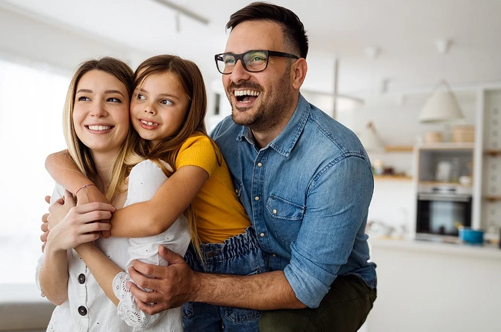Family of a veteran hugging